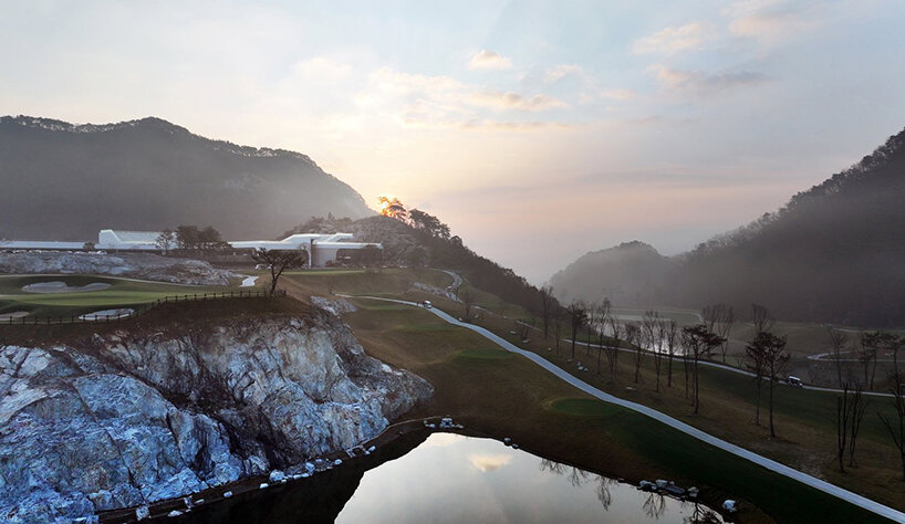 LESS architects weaves new clubhouse into the hilly landscape of wonju in south korea