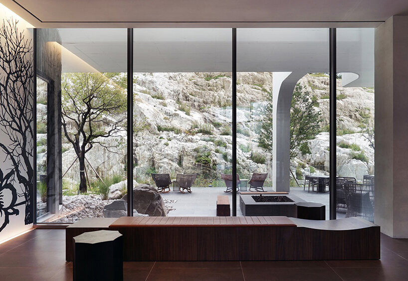 LESS architects weaves new clubhouse into the hilly landscape of wonju in south korea