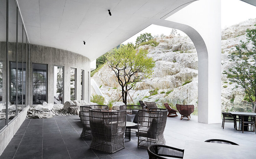 LESS architects weaves new clubhouse into the hilly landscape of wonju in south korea