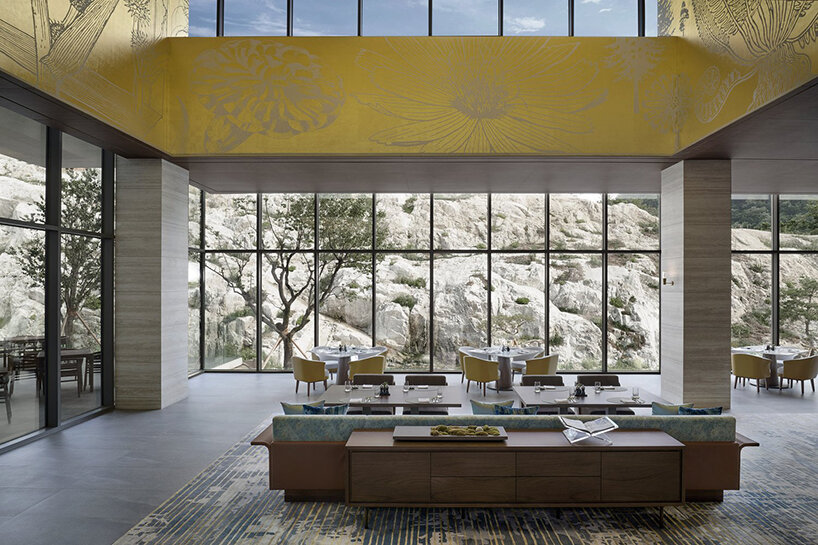 LESS architects weaves new clubhouse into the hilly landscape of wonju in south korea