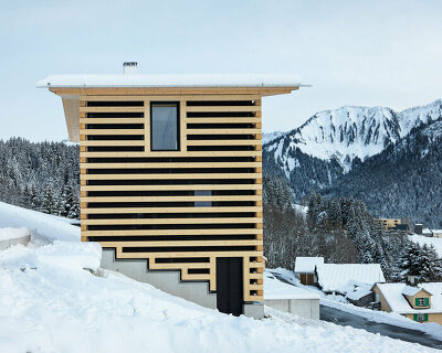 marte marte architects modernizes the traditional austrian log cabin