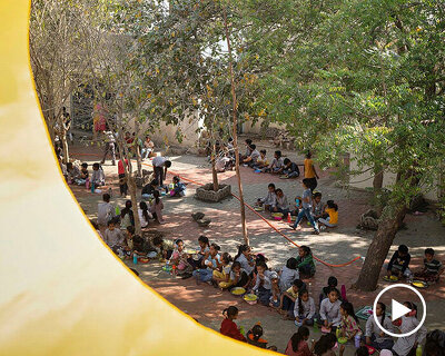 circular openings breathe views of nature and light into rural school extension in india