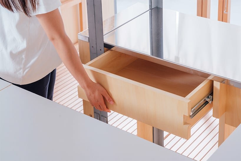 a drawer that can be used from both sides under the counter