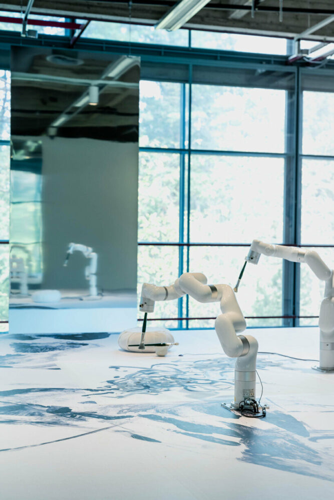 sougwen chung co-creates & meditates with multi-robotics through biosensors
