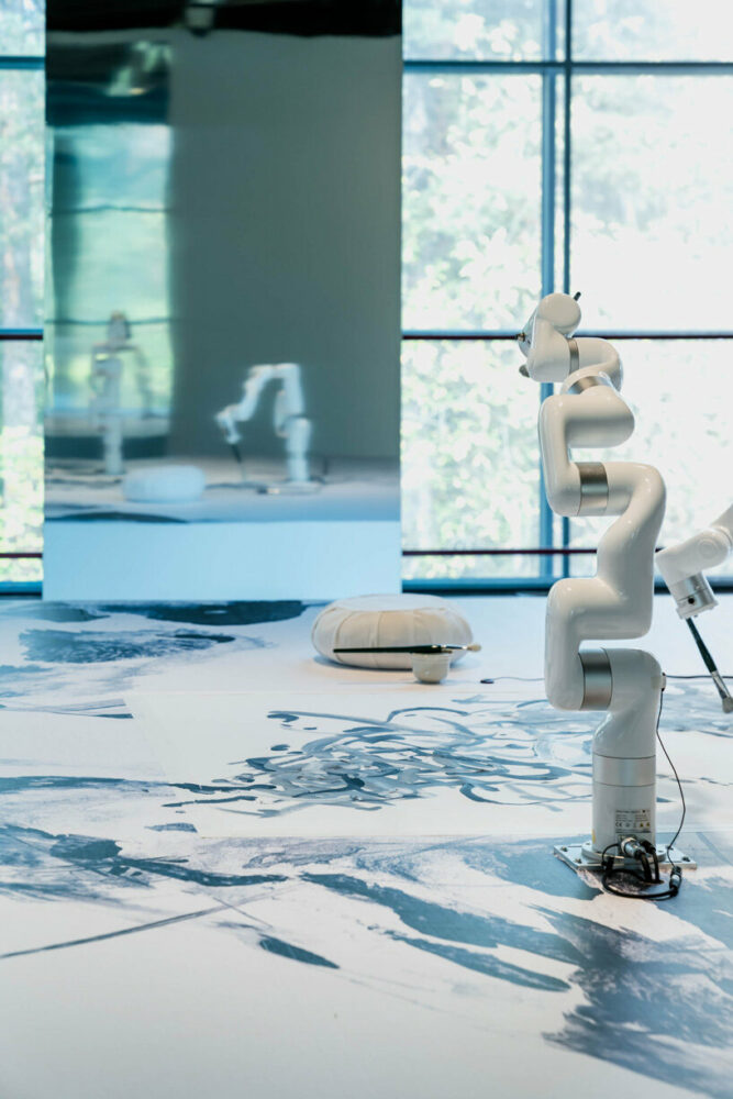 sougwen chung co-creates & meditates with multi-robotics through biosensors