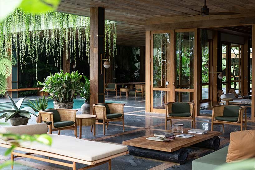 perched amidst a forest in bali, the ravine dwelling blurs the line between indoor & outdoor