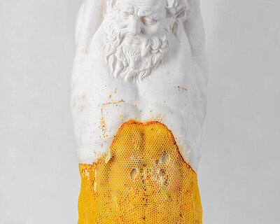 tomáš libertíny covers 'marsyas' sculpture with beeswax to symbolize healing & forgiveness