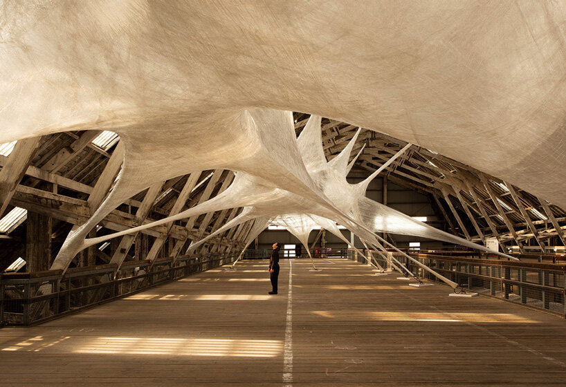 numen/for use stretches giant cocoon-like installation across historic dockyard chatham
