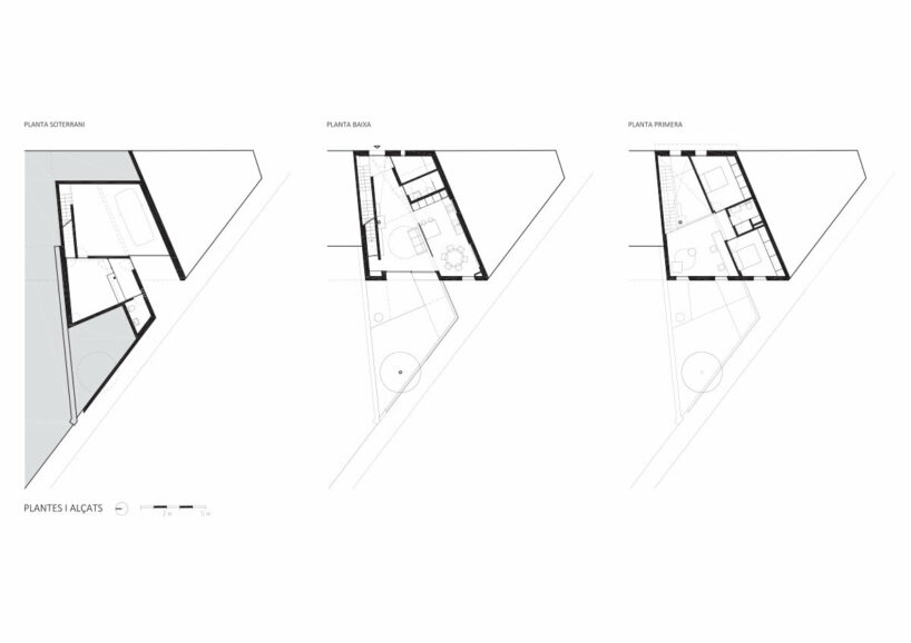 contemporary ‘casa nus’ is wedged into the historic streets of olot, spain