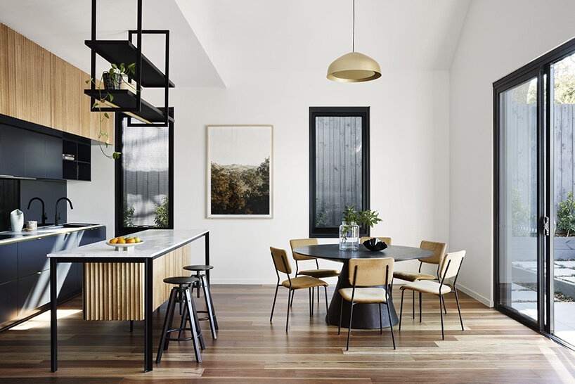 austin maynard disguises fourteen-unit ‘slate house’ as a small dwelling in melbourne