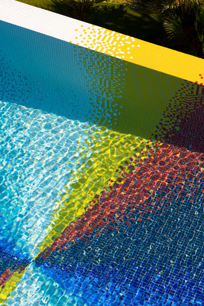 felipe pantone pixelates residential swimming pool with 130,000 rainbow glass mosaics