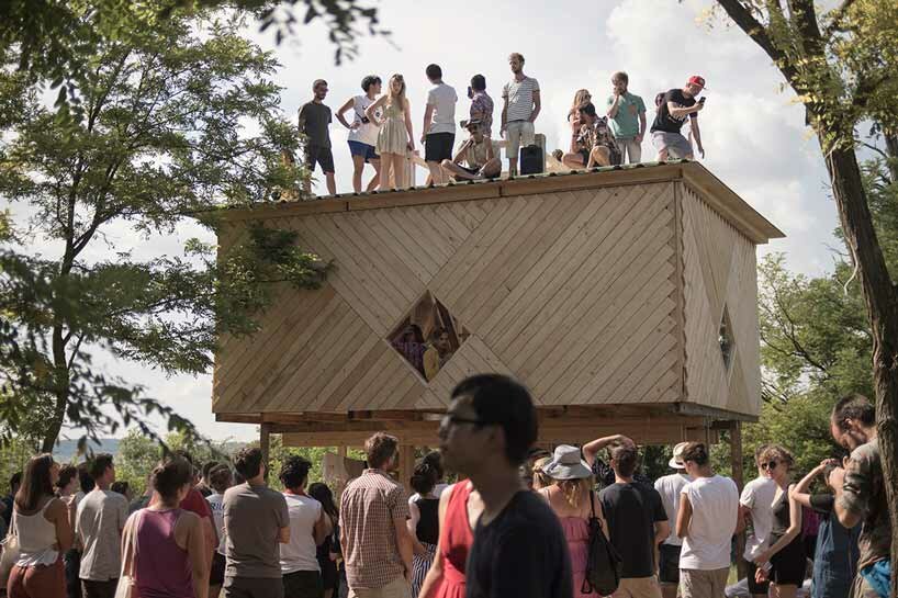 students from around the world build temporary pavilions for hello wood's art camp