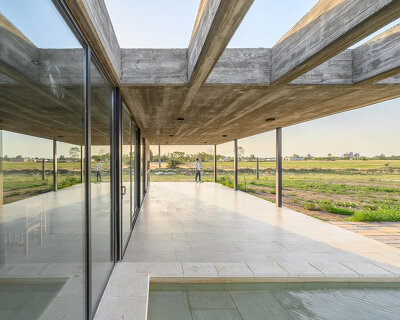 karlen + clemente studio sites its casa 3X6 within the vast landscape of rural argentina