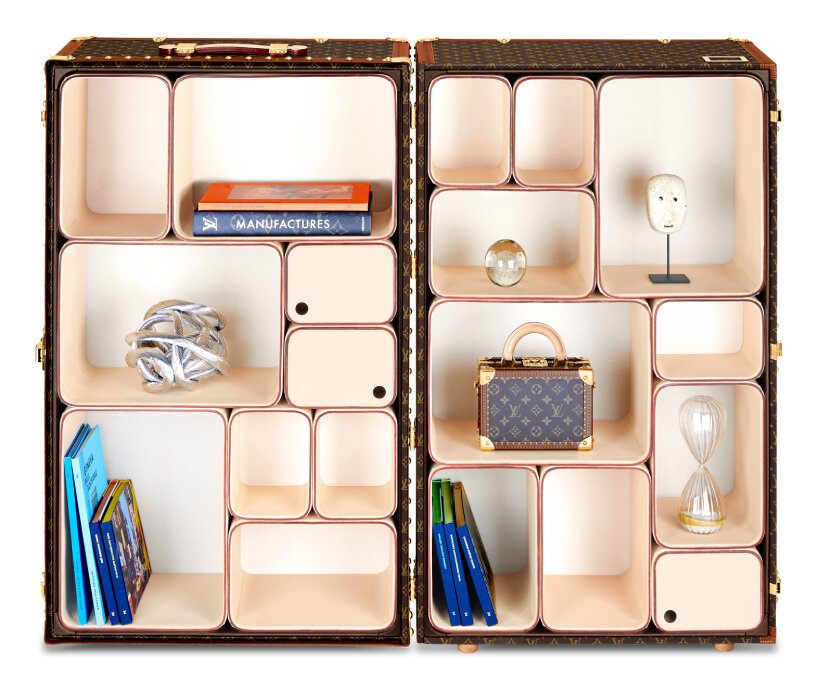 Louis Vuitton and Marc Newson collaborated on an artistic masterpiece  dubbed the Cabinet of Curiosities. The designer reimagines the iconic  travel trunk with removable leather storage cubes in an array of colors 