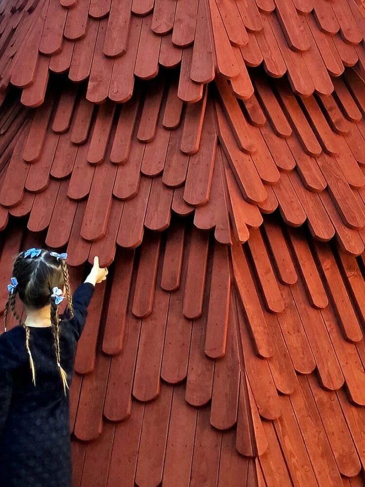 UMA nestles children’s library inside spruce tree-shaped installation in sweden