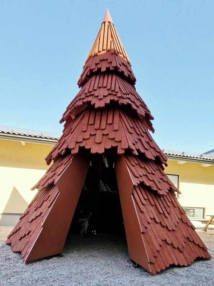 UMA nestles children’s library inside spruce tree-shaped installation in sweden