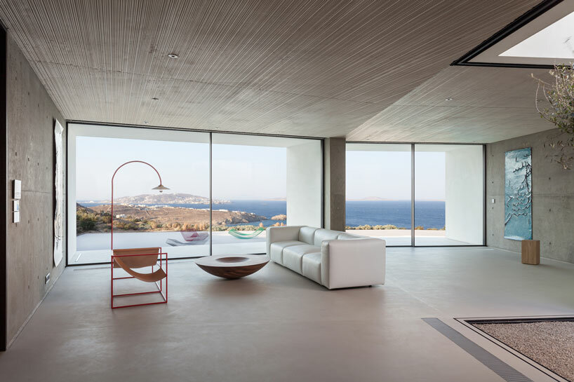 interview: a31 carves arid mykonian landscape with subterranean latypi residence in greece