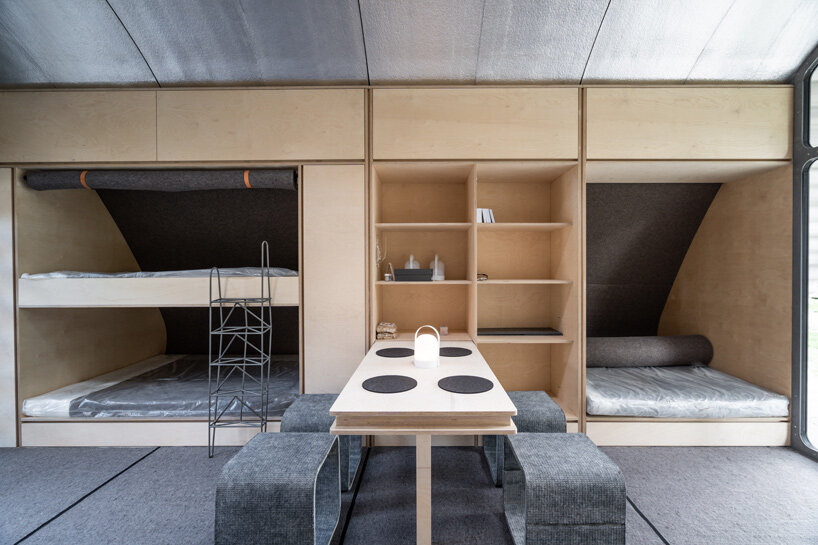 interview: norman foster & holcim explore global refugee crisis with essential homes prototype in venice