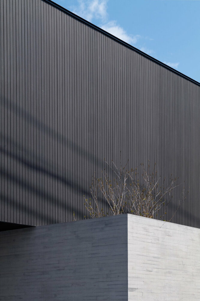 using composite lumber and exposed concrete to shape the cubes 