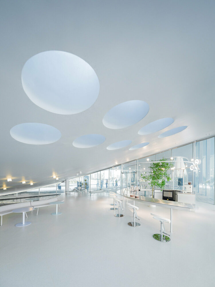 sou fujimoto’s ‘sky mountain’ curls up the coastal landscape of hainan province