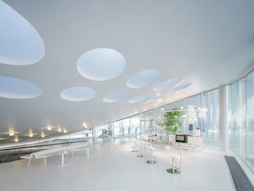 sou fujimoto’s ‘sky mountain’ curls up the coastal landscape of hainan province