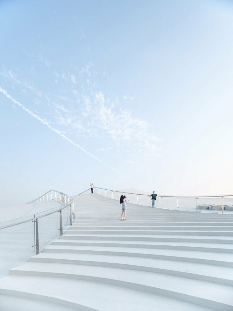 sou fujimoto’s ‘sky mountain’ curls up the coastal landscape of hainan province