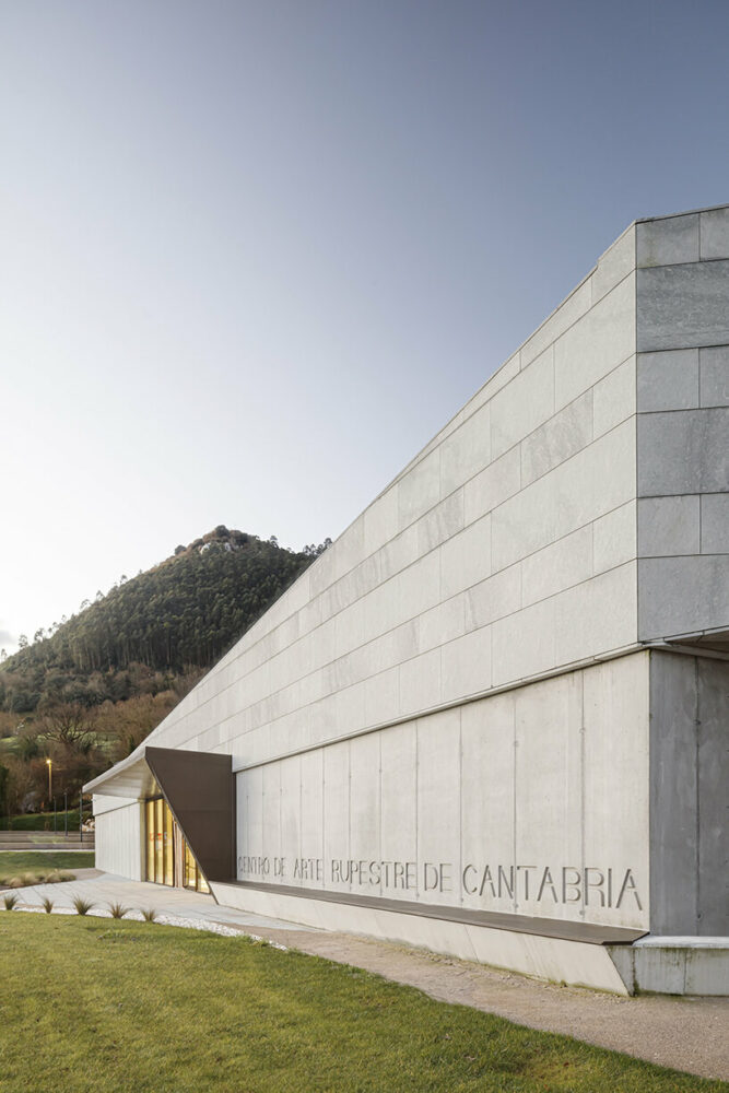 a folded stone roof crowns this visitor center in the spanish hillside