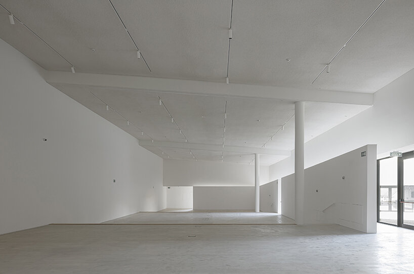 a folded stone roof crowns this visitor center in the spanish hillside