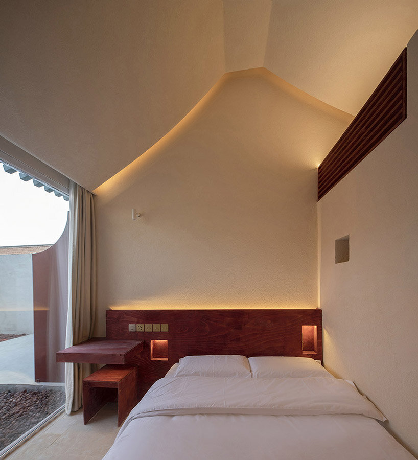 atelier d’more revives traditional beijing architecture with playful intervention