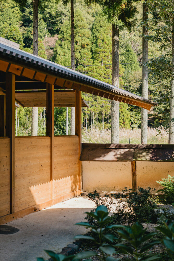 locally sourced wood and traditional japanese joinery shape 2m26's horse stable in kyoto