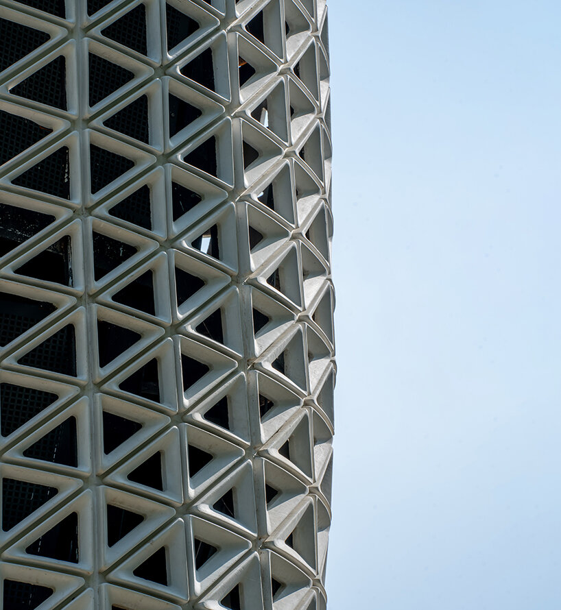 studio symbosis’ aerodynamic + multidirectional air purification tower emerges in new delhi