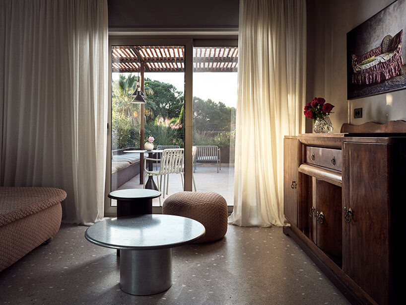 handcrafted, cave-like surfaces engulf ekies all senses resort’s redesigned suites in greece