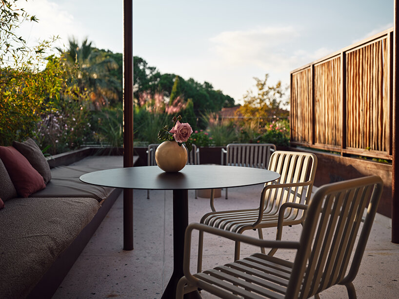 handcrafted, cave-like surfaces engulf ekies all senses resort’s redesigned suites in greece