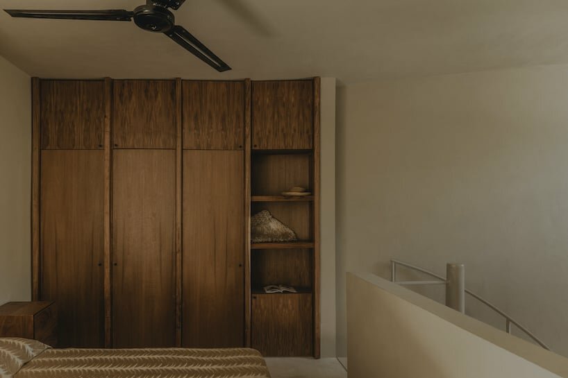 the project includes custom-made wood furniture