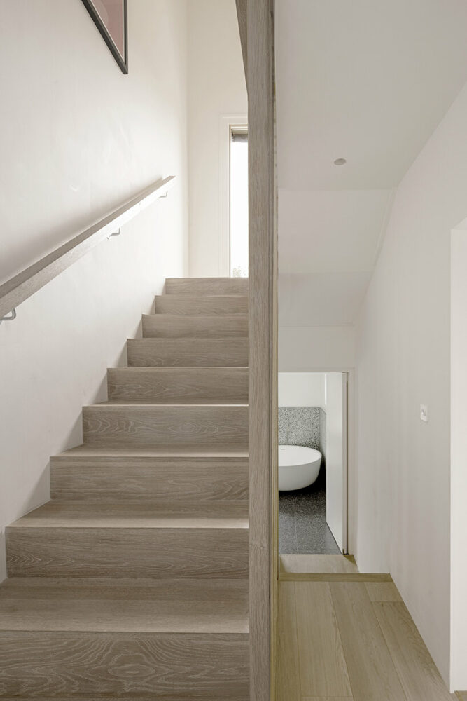 new hallway area with access to the main staircase and new guest toilet