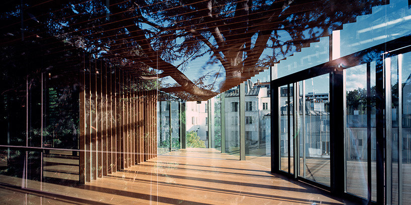 explore kengo kuma's wooden architecture through the lens of