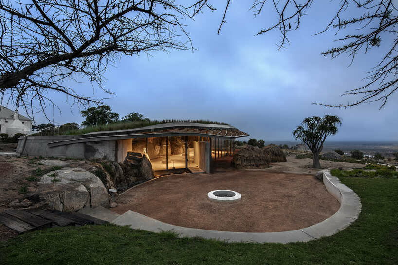 the design is conceived as part of the terrain crafting an organic landscape