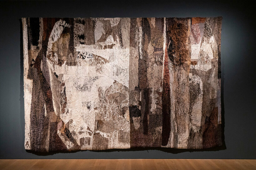 woven biomorphic sculptures by magdalena abakanowicz hover inside MCBA in switzerland