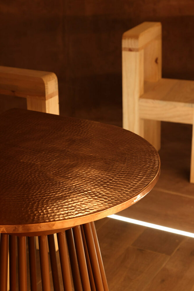 ‘el maguey’ mexican mezcal bar is designed with an earthy, underground atmosphere