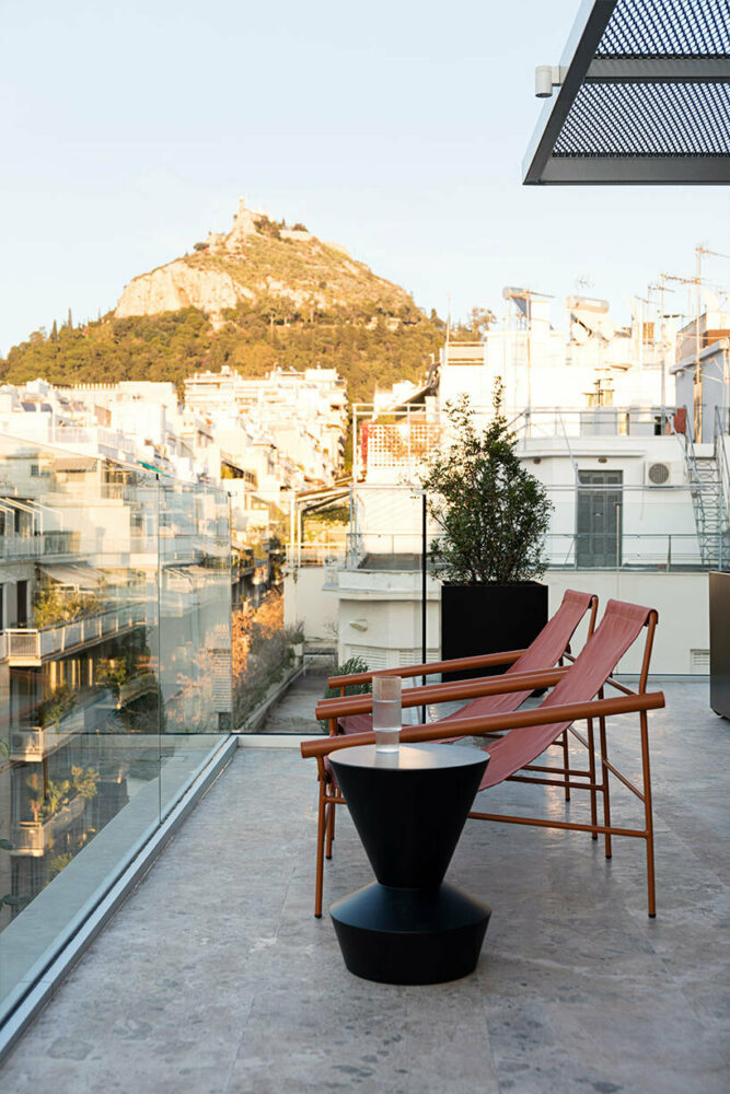 the top floor enjoys unobstructed views of Lycabettus Hill