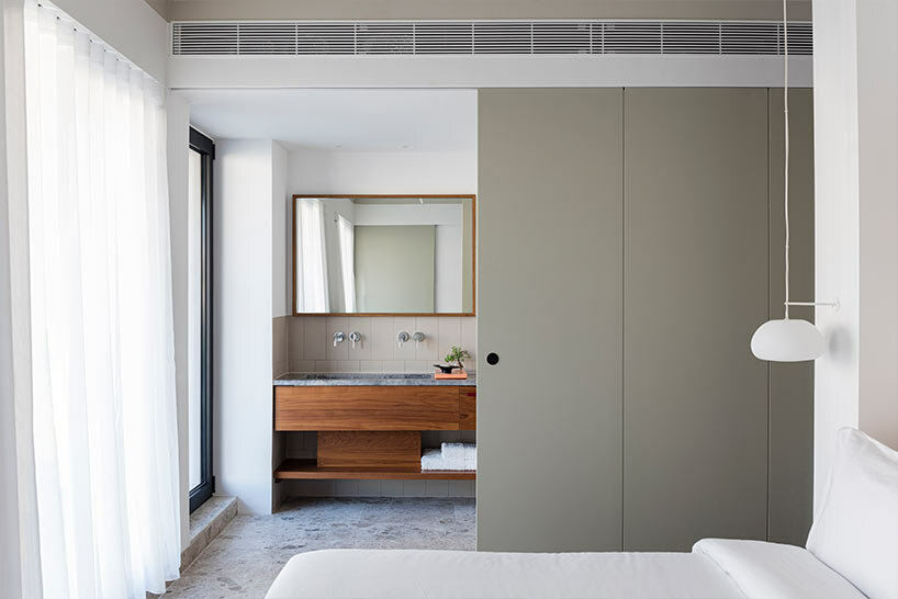 OOAK architects’ undulating hotel facade embraces an urban escape in athens