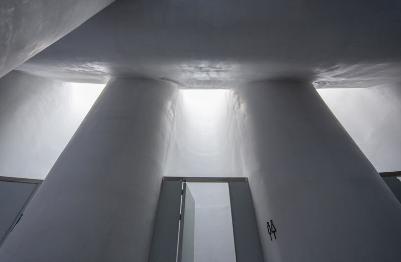 PAO's public restroom meanders around amoeba-shaped concrete structure in beijing