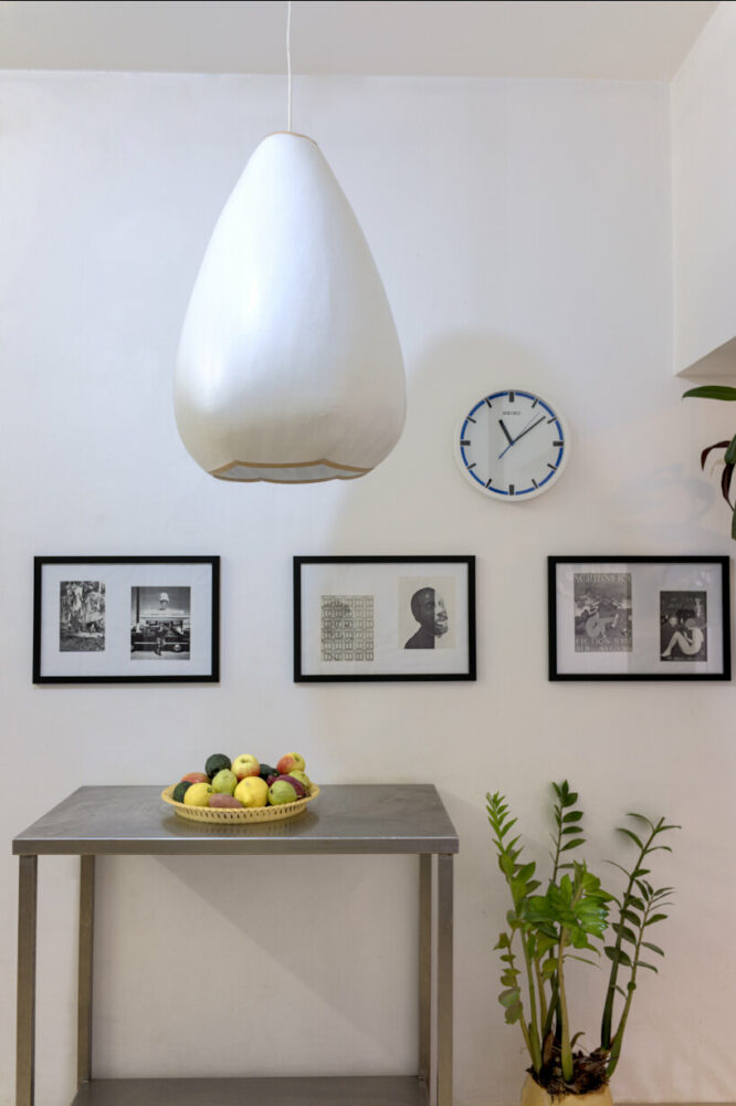 paper sheets overlap in geometric patterns to filter soft light through gilad hadar's lanterns