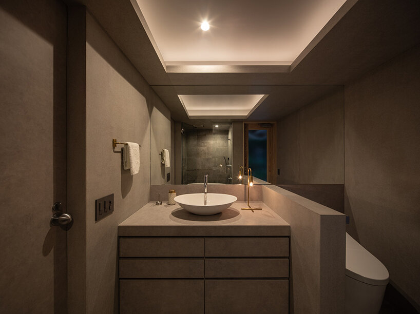 on a secluded japanese hill, ryosuke ono nestles a stilted rental villa with a panoramic porch