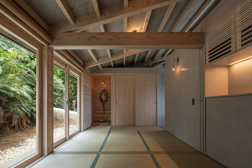 on a secluded japanese hill, ryosuke ono nestles a stilted rental villa with a panoramic porch