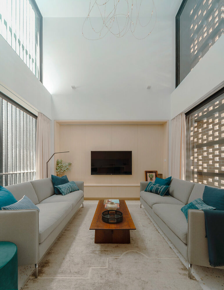 living room with double height ceiling