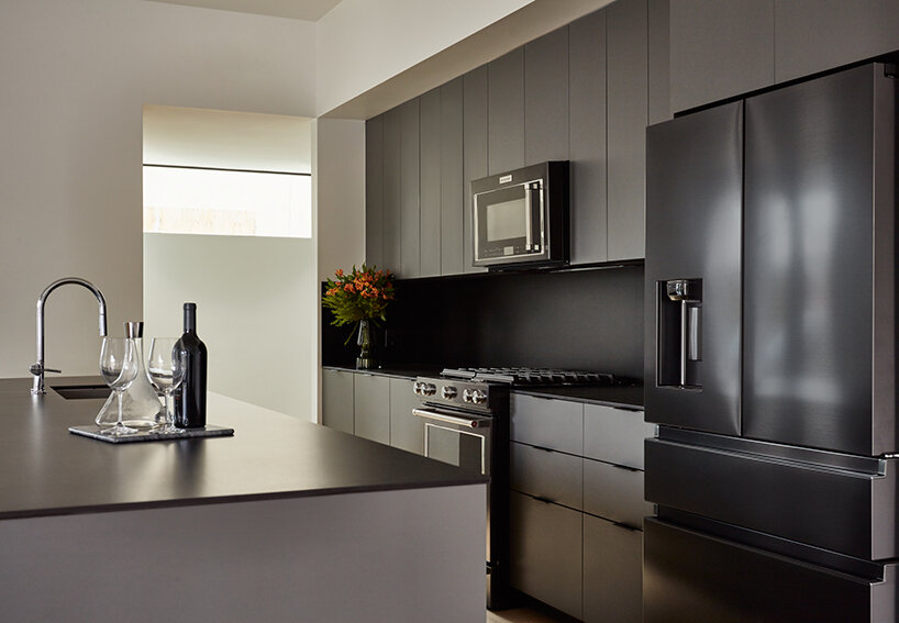 bittoni architects’ los angeles duplex is a minimalist take on a traditional pitched-roof home