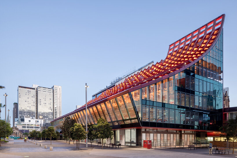 manuelle gautrand's tessellated roof drapes over phive civic center in parramatta, sydney 