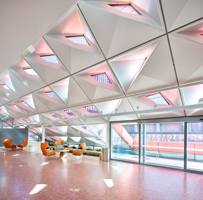 manuelle gautrand's tessellated roof drapes over phive civic center in parramatta, sydney 