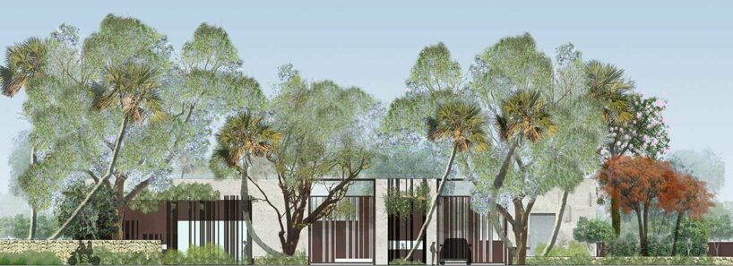 a corten steel gatehouse is overgrown by tropical nature in coconut grove, miami